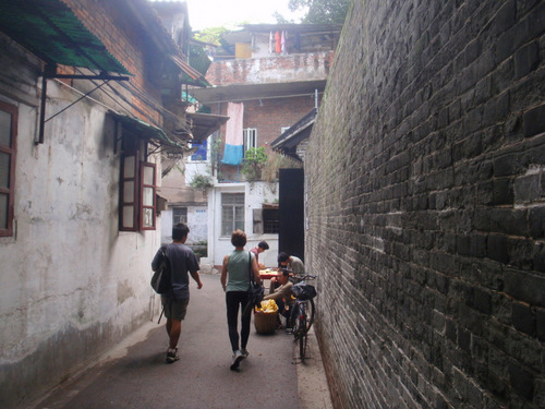 Vincent is leading Terry and Dennis through the back ally.